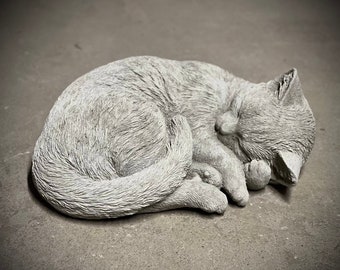 Concrete cat laying on back statue Detailed cat figure Sleeping kitty figurine Outdoor cat memorial sculpture