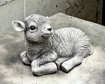 Concrete laying sheep statue Detailed resting lamb figure Outdoor garden sculpture