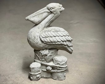 Detailed pelican on post statue Concrete wild bird sculpture Handmade garden or backyard decoration