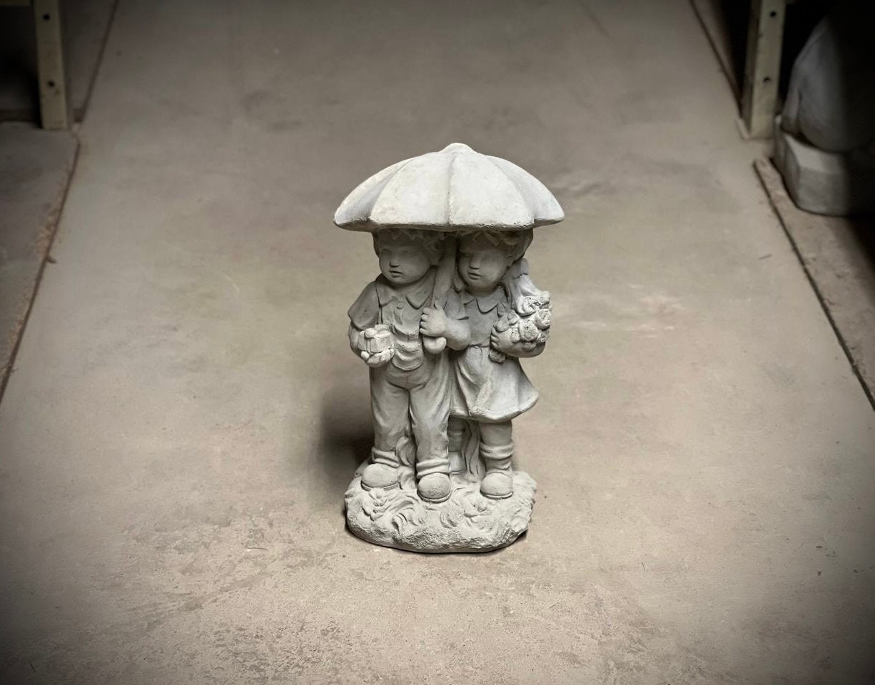Two Kids Under Umbrella Statue Standing Boy and Girl Under