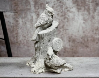 Concrete cardinals on stump statue Realistic bird figure Outdoor or indoor sculpture