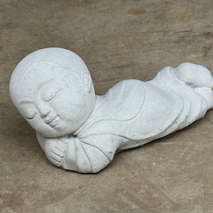 Laying Buddha boy statue Baby Buddha figure Concrete garden art Outdoor decoration Zen garden sculpture