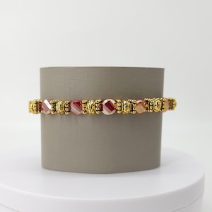 Iridescent Red Glass Beaded Stretch Bracelet with Gold-tone Accents