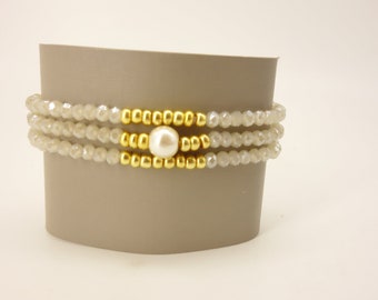 Triple Strand Faceted Glass Beaded Stretch Bracelet with Gold-tone and Pearl Accents