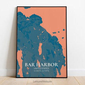 May include: A map print of Bar Harbor, Maine, United States. The map is in a teal blue color on a peach background. The text "Bar Harbor, United States, 44.3882°N, -68.2091°W" is printed in white at the bottom of the map.