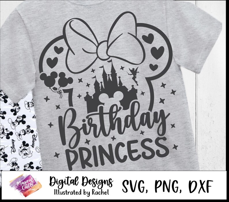 May include: A light gray t-shirt featuring a black graphic design for a 7th birthday. The design includes a bow, Mickey Mouse ears, a castle, stars, and the words "Birthday Princess". The shirt also has the text "Digital Designs" and "Illustrated by Rachel".