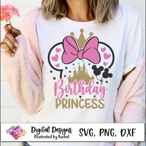 May include: White t-shirt with a pink bow, gold crown, and the words "Birthday Princess" in pink and gold. The design includes a castle silhouette and Mickey Mouse balloons. The shirt is part of a digital design collection.