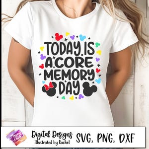 May include: White t-shirt featuring the phrase "TODAY IS A CORE MEMORY DAY" in black, adorned with colourful Mickey Mouse icons and a Minnie Mouse bow. The shirt also has a graphic that says "Digital Designs SVG, PNG, DXF".