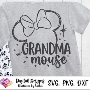 May include: A grey t-shirt with a black and white illustration of Mickey Mouse ears and a bow. The text "Grandma Mouse" is printed in black below the illustration.