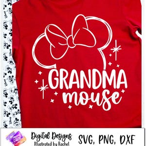 May include: Red t-shirt with a white outline of Mickey Mouse ears and a bow. The text "Grandma Mouse" is written in white below the ears.