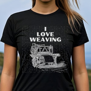May include: A black t-shirt with a white graphic of a weaving loom and the text "I Love Weaving".