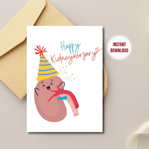 May include: A greeting card featuring a cartoon kidney wearing a party hat, with the words "Happy Kidneyversary" in blue and red. The card is on a white background with a beige envelope.
