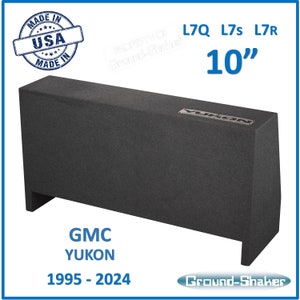 May include: A black subwoofer enclosure for a GMC Yukon, made in the USA. The enclosure is designed for a 10-inch subwoofer and is labeled "L7Q L7s L7R".