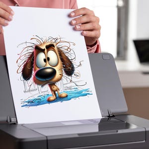 K&ouml;nnte beinhalten: Ein schwarz-grauer Drucker mit einem wei&szlig;en Blatt Papier, das aus dem Papierfach kommt. Das Papier zeigt eine Comic-Illustration eines braunen Hundes mit einem &uuml;berraschten Ausdruck.