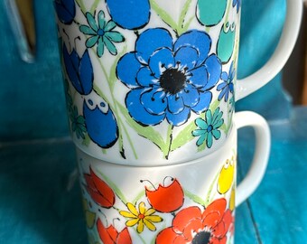 Adorable bright floral vintage staking mugs