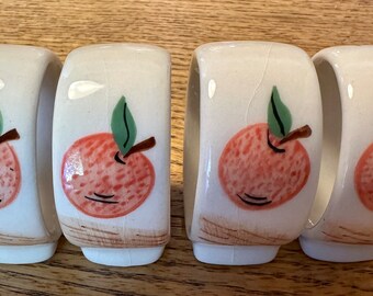Set of 4 vintage porcelain orange napkin rings