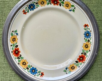 vintage decorative collectable plate with silver rim