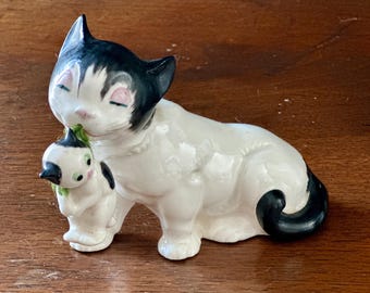 vintage momma cat and kitten figurine, black and white cats, mom holding baby, cat and kitten