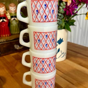vintage set of 4 Termocrisa milk glass stacking mugs with a red diamond pattern