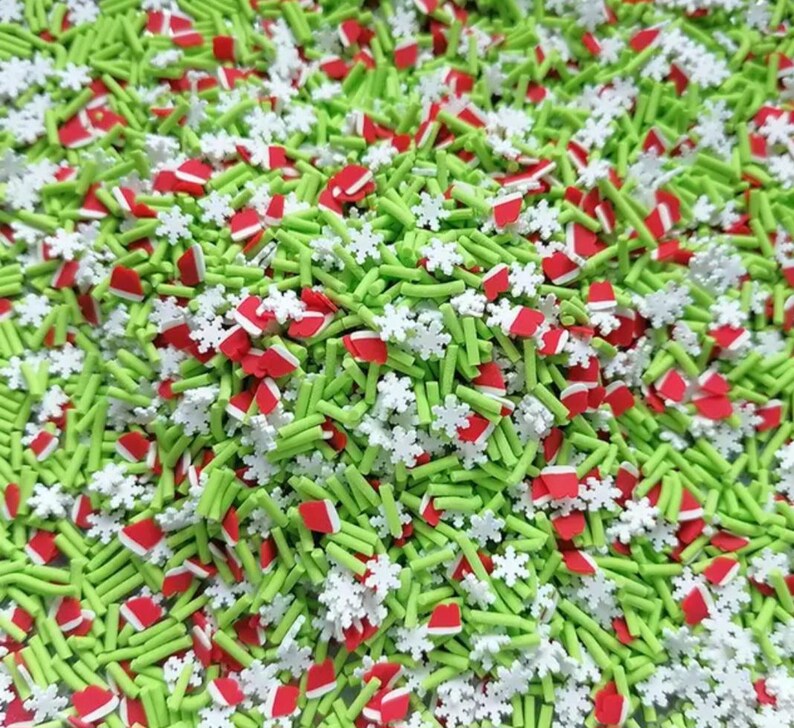 Green Sprinkles White Snow Flakes and Red Santa Clause Hat A Classic ...