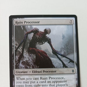 May include: A white card with black text and a gray and red Eldrazi Processor creature illustration. The card text reads "Ruin Processor" and "When you cast Ruin Processor, you may put a card an opponent owns from exile into that player's graveyard. If you do, you gain 5 life. The Eldrazi continue to sweep through the wastes, compounding destruction that already seemed absolute."