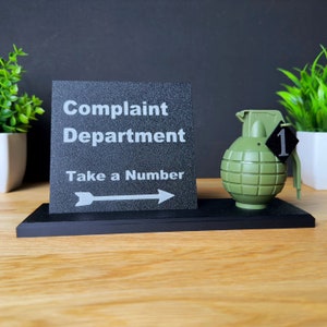 Complaint department take a number with grenade sign - Office decor