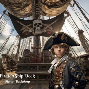 May include: A young pirate dressed in a black jacket, white shirt, and a blue and gold tricorne hat stands on the deck of a pirate ship. The ship's mast is visible in the background, along with a black pirate flag with a skull and crossbones.