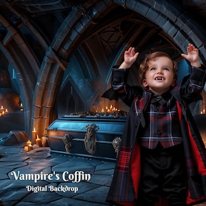 May include: A young child dressed as a vampire stands in a dark, gothic setting with a blue coffin and candles. The child is wearing a black and red cape and a plaid shirt. The text "Vampire's Coffin - Digital Backdrop" is at the bottom of the image.