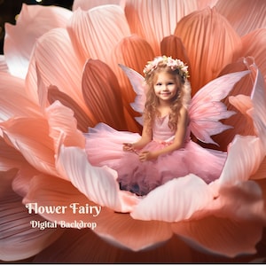 May include: A young girl dressed as a fairy sits inside a large, pink flower. She is wearing a pink dress with a white tulle skirt and a flower crown. Her wings are white with a pink and purple gradient. The flower is a large, pink blossom with many petals.