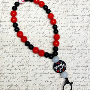 Pulsera con función de cambio de página para Kindle, iPad y lector electrónico. Silicona rosa, negro con efecto romance picante y rojo.