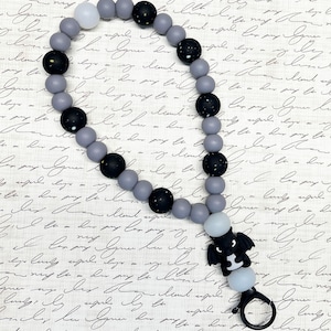 Pulsera con función de cambio de página para Kindle, iPad y lector electrónico. Silicona, diseño de dragón de fantasía negro.