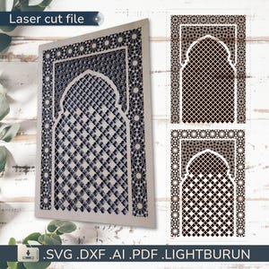 May include: A laser-cut file with a detailed geometric pattern in an arched window shape. The design has a layered, three-dimensional appearance. The text "Laser cut file" is at the top. File formats include SVG, DXF, AI, PDF.
