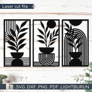 Peut inclure: Ensemble de trois panneaux muraux noirs découpés au laser, présentant des motifs botaniques. Chaque panneau représente une plante en pot avec des motifs géométriques et en arc. Le texte "Laser cut file" est en haut.