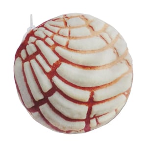 May include: A round, off-white object with a red and white pattern resembling a concha pastry. The design features curved lines and rectangular shapes, with a small white tag attached at the top. The object is set against a plain white background.
