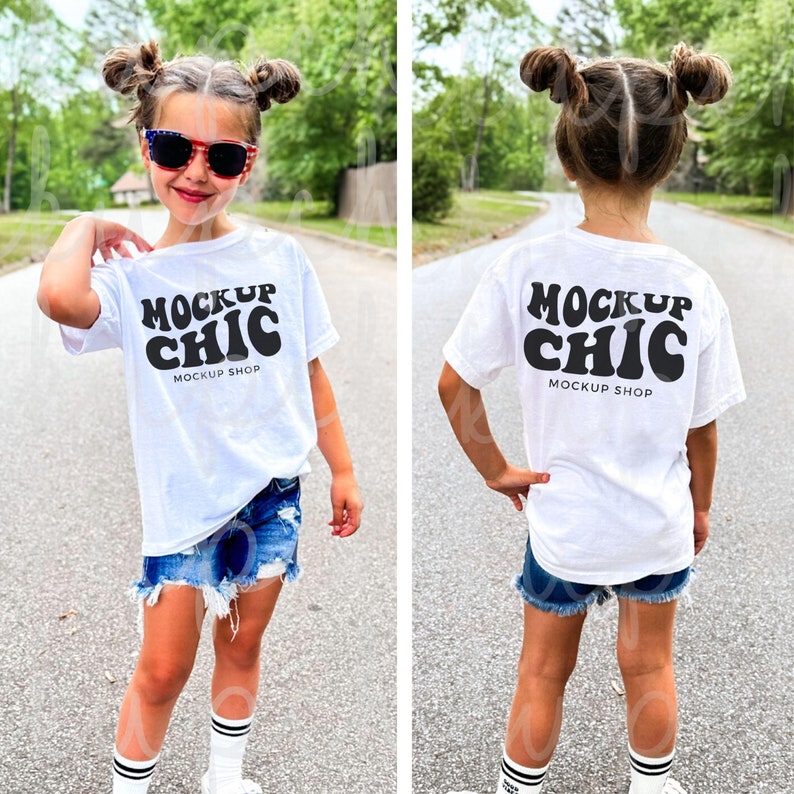 May include: White t-shirt with black text that says "MOCKUP CHIC" and "MOCKUP SHOP" on a child wearing denim shorts and white socks.
