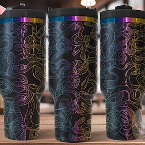 May include: Three stainless steel travel mugs with a black background and a colorful snake pattern. The mugs have a handle and a lid.