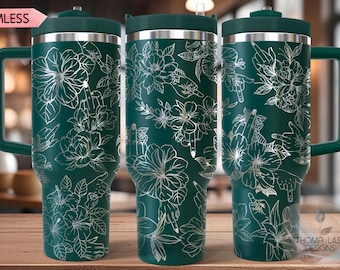 May include: Three green stainless steel travel mugs with white floral and hand designs. The mugs have lids and handles.