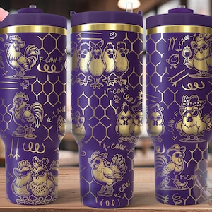 May include: Purple tumbler with gold rooster and chicken designs. The tumbler has a handle and a lid. The design includes the text "F-CAW-F" and a honeycomb pattern. The tumbler is approximately 9 inches tall.