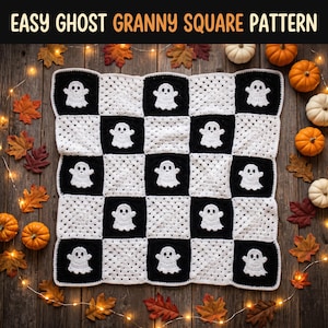 May include: A crochet blanket featuring a checkerboard pattern of black and white squares, with each white square containing a small white ghost motif. The text "EASY GHOST GRANNY SQUARE PATTERN" is displayed at the top of the image.