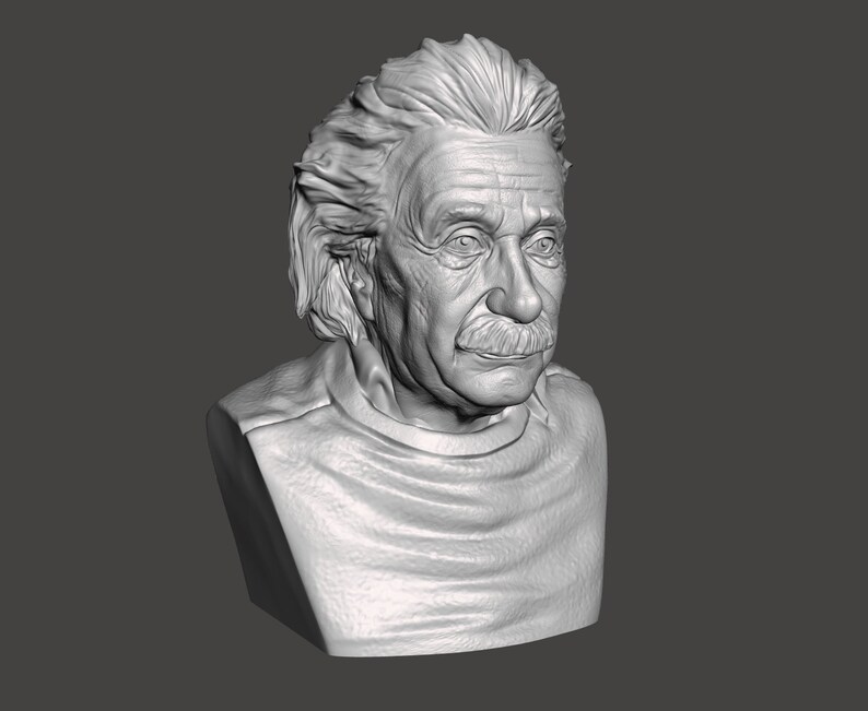 May include: A gray bust sculpture of Albert Einstein with a white, textured base. The sculpture depicts Einstein with his signature wild hair and mustache.