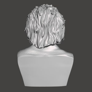 May include: A white plaster bust sculpture of a person with short, wavy hair. The bust is viewed from the back, showing the back of the head and neck.