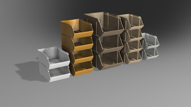 Peut inclure: Trois ensembles de bacs de rangement empilables, un ensemble est blanc, un ensemble est brun et un ensemble est jaune. Les bacs sont en plastique et ont une forme rectangulaire.