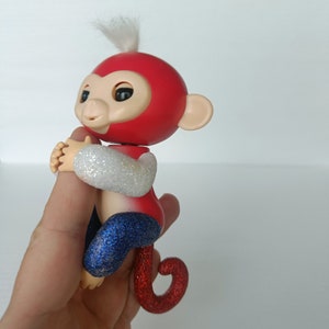 Fingerlings - Interactive Baby Monkey - Zoe (Turquoise with Purple Hair) By  WowWee