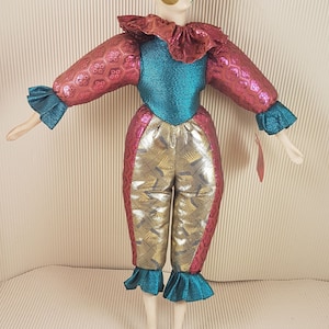 Vintage clown pink blue gold doll