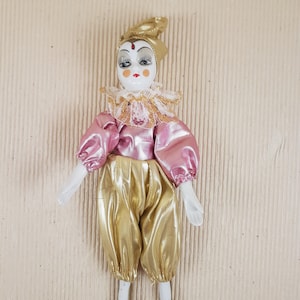 Vintage porcelain clown colorful doll