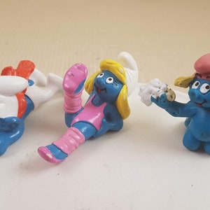 Schleich Flying Smurf with red scarf, Smurfs 20183 Aerobic Smurfette, 20448'Smurf Baby Bathing, Peyo Figurine image 1