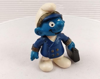 Figura de Pitufo piloto de aerolínea Schleich Peyo con maleta