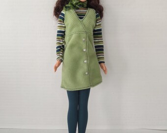 Vintage stylish doll Barbie in green