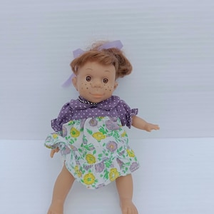 Vintage mini Danton plastic doll happy girl