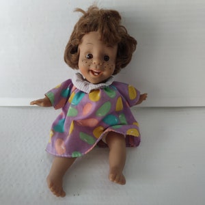 Vintage mini Danton plastic doll happy girl